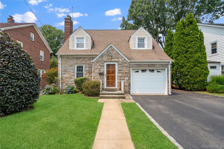 19 Chestnut St, Glen Cove, NY: 1938 stone-front expanded Cape that sold for $775,000