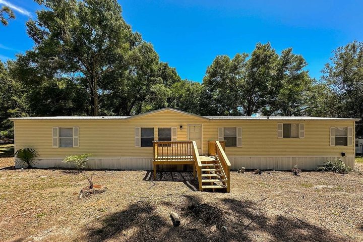 21614 43rd Dr, Lake City, FL: remodeled four-bedroom home on 5 acres that sold for $253,000